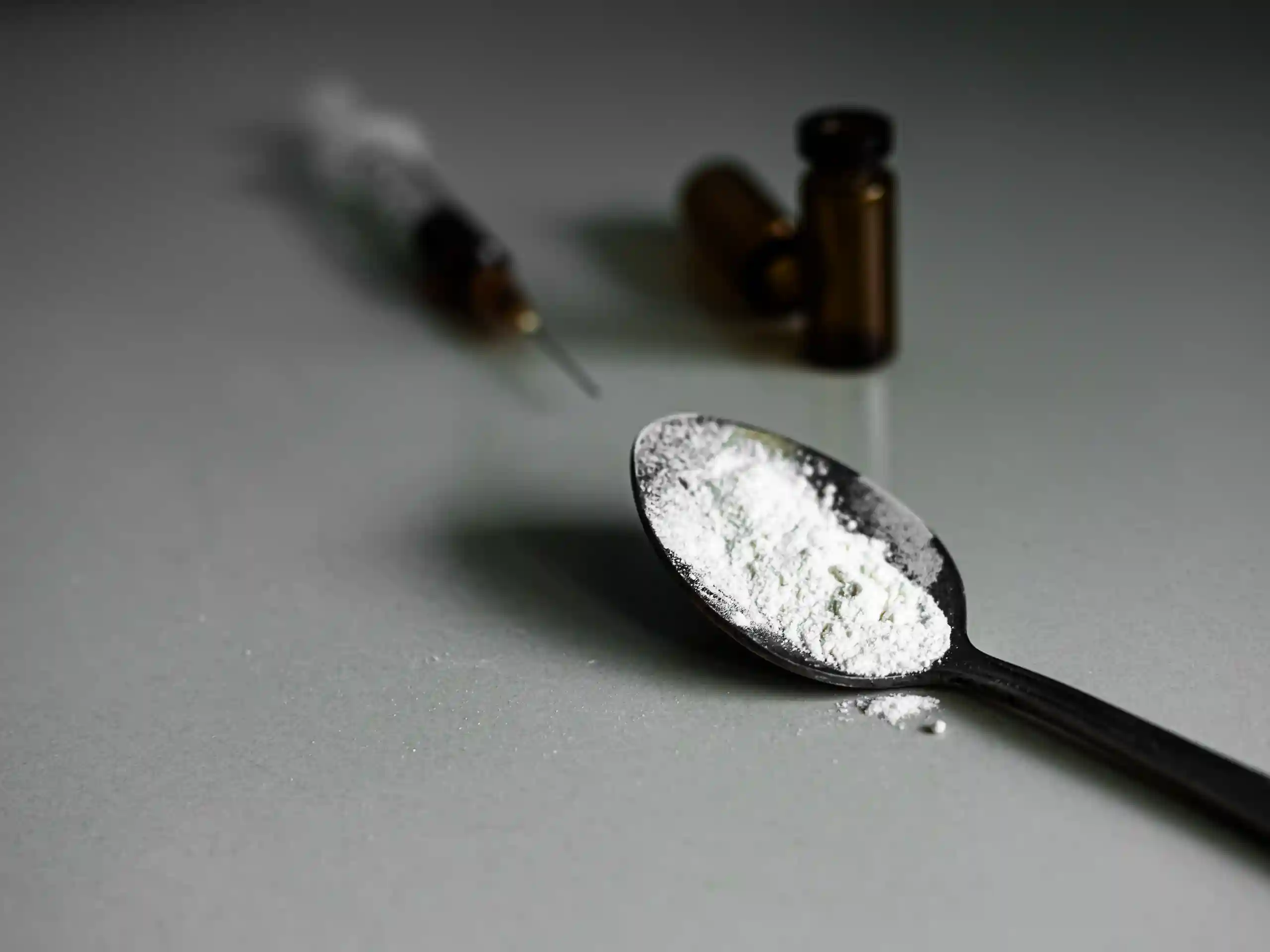 Powdered narcotic sitting in a spoon